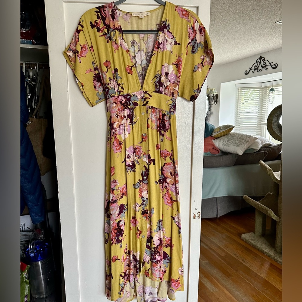 Brand new without tags lovestitch dress. Beautiful floral print-